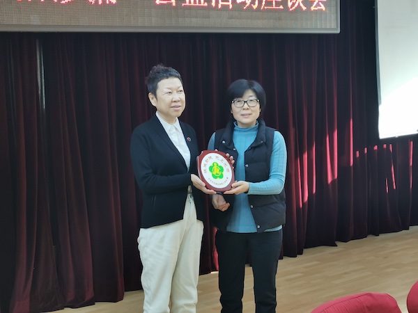 09北京市东城区肢残人协会赠予中国建筑防水协会光荣牌_IMG_20211221_142016.jpg